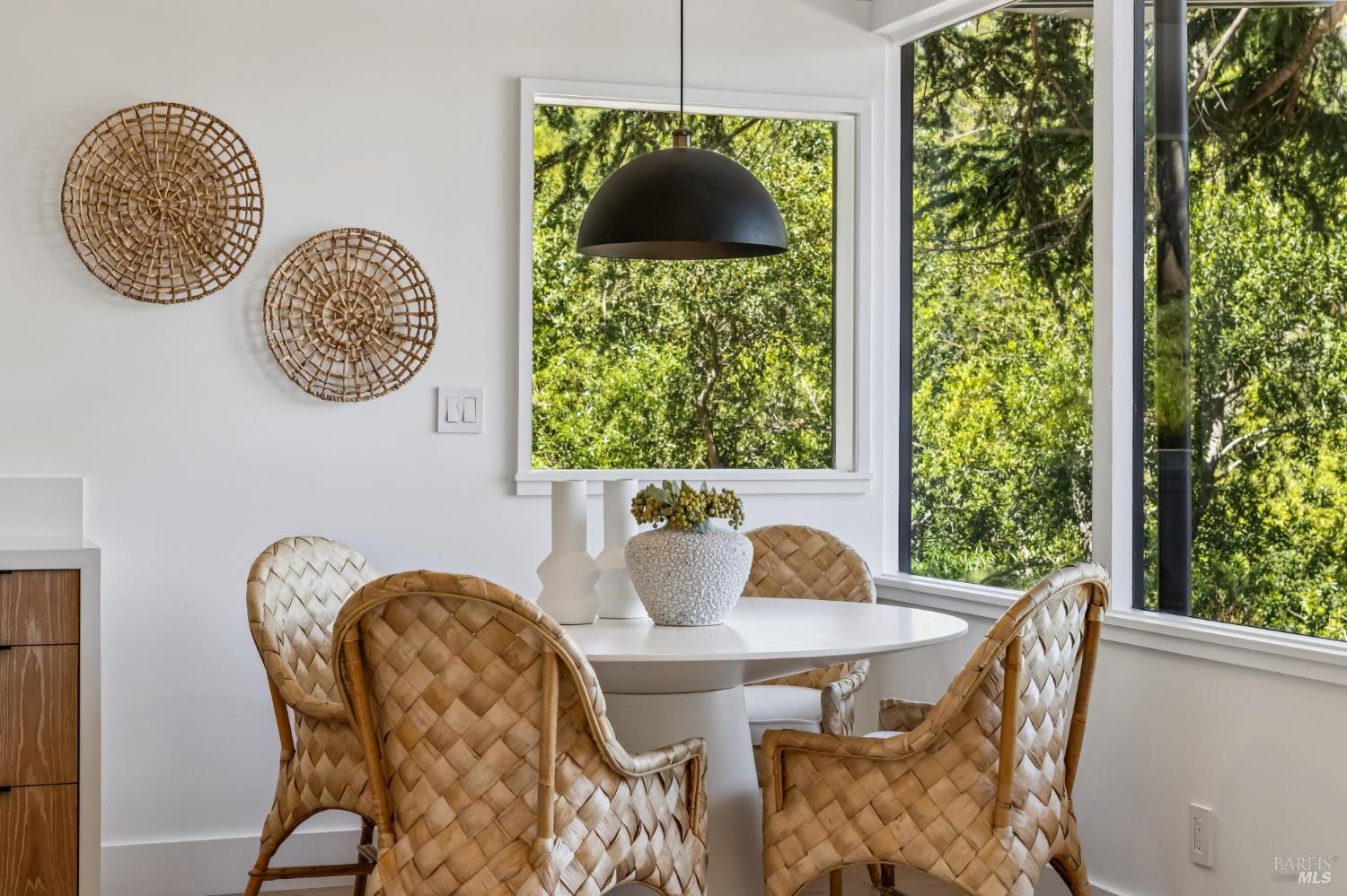 485 Scenic Road Fairfax, CA 94930 - Photo 28 of 75 a view of a dining room with furniture and chandelier