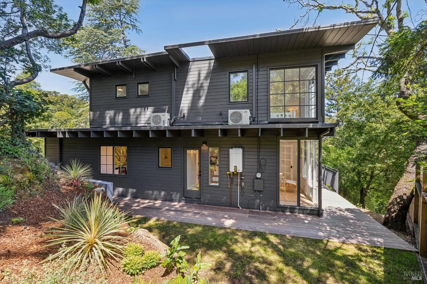 485 Scenic Road Fairfax, CA 94930 - Photo 43 of 75 a front view of a house with a yard