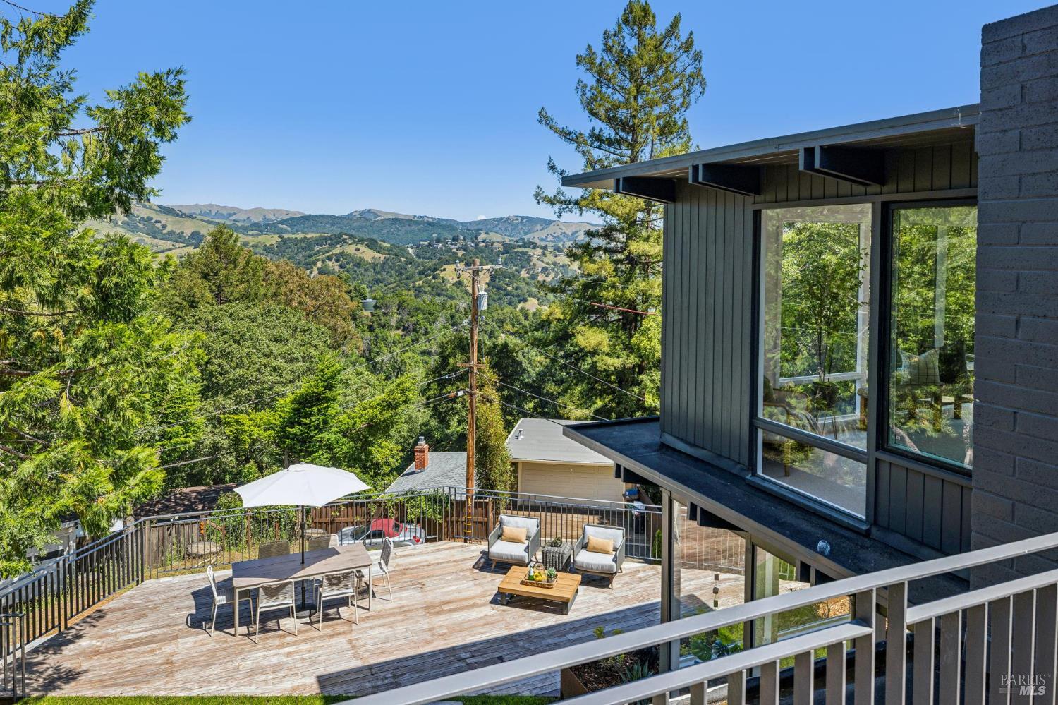 485 Scenic Road Fairfax, CA 94930 - Photo 63 of 75 a view of balcony with furniture and umbrella