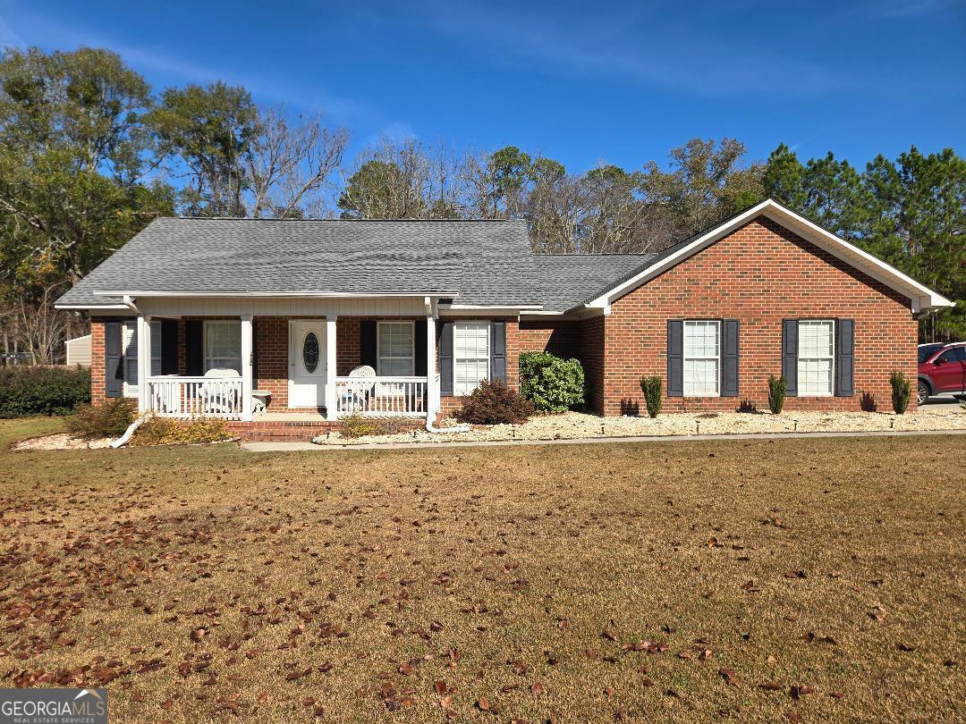 5002 Addison Trail Statesboro, GA 30458 - Photo 1 of 35 a front view of a house with a garden