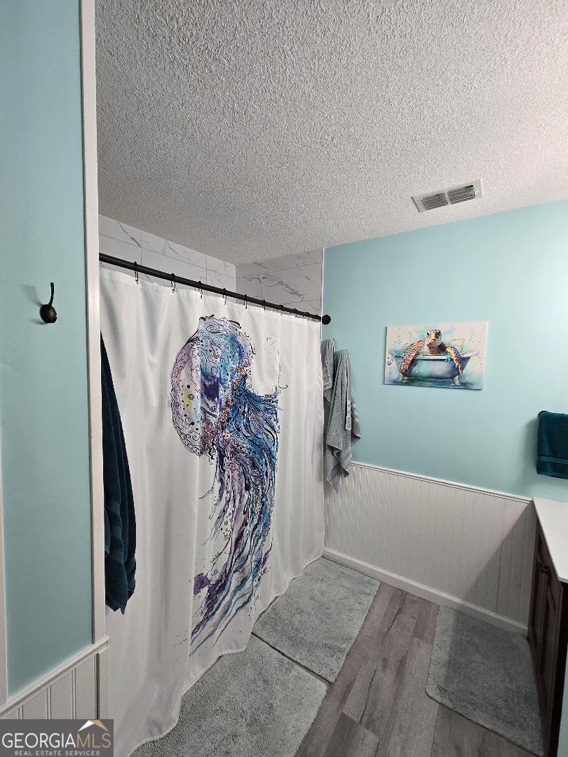 5002 Addison Trail Statesboro, GA 30458 - Photo 16 of 35 a view of a room with rack and toys