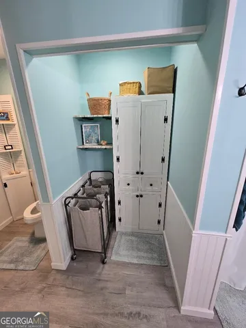 a view of storage and utility room with furniture