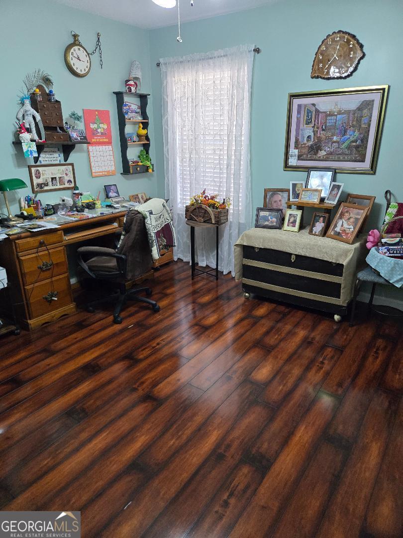 5002 Addison Trail Statesboro, GA 30458 - Photo 26 of 35 a living room with furniture and a wooden floor