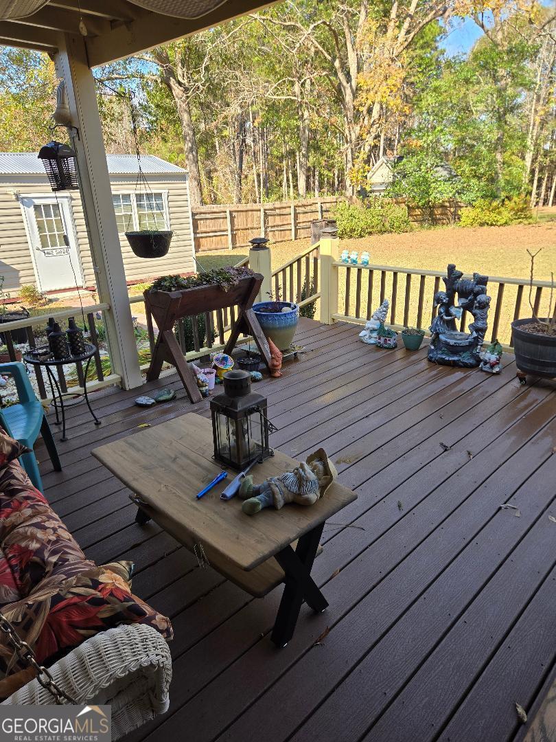 5002 Addison Trail Statesboro, GA 30458 - Photo 28 of 35 a living room with furniture and wooden floor