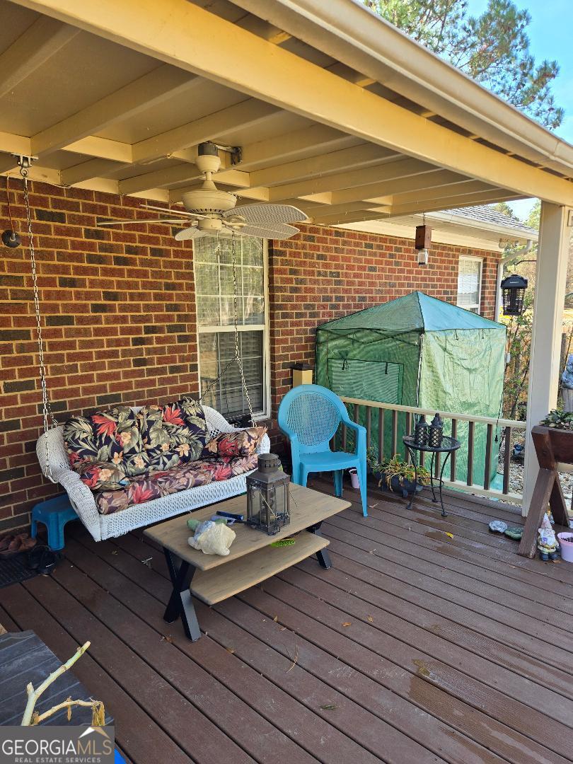 5002 Addison Trail Statesboro, GA 30458 - Photo 29 of 35 a balcony with furniture and a potted plant