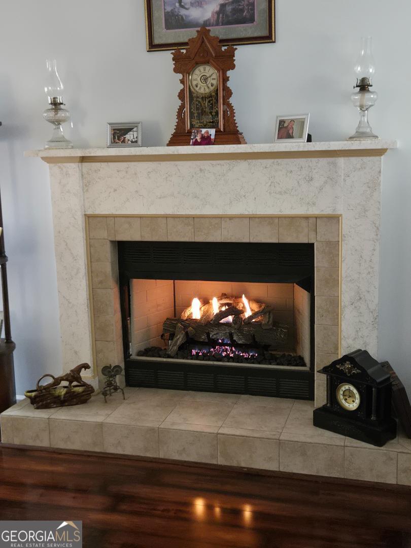 5002 Addison Trail Statesboro, GA 30458 - Photo 6 of 35 a living room with a fireplace
