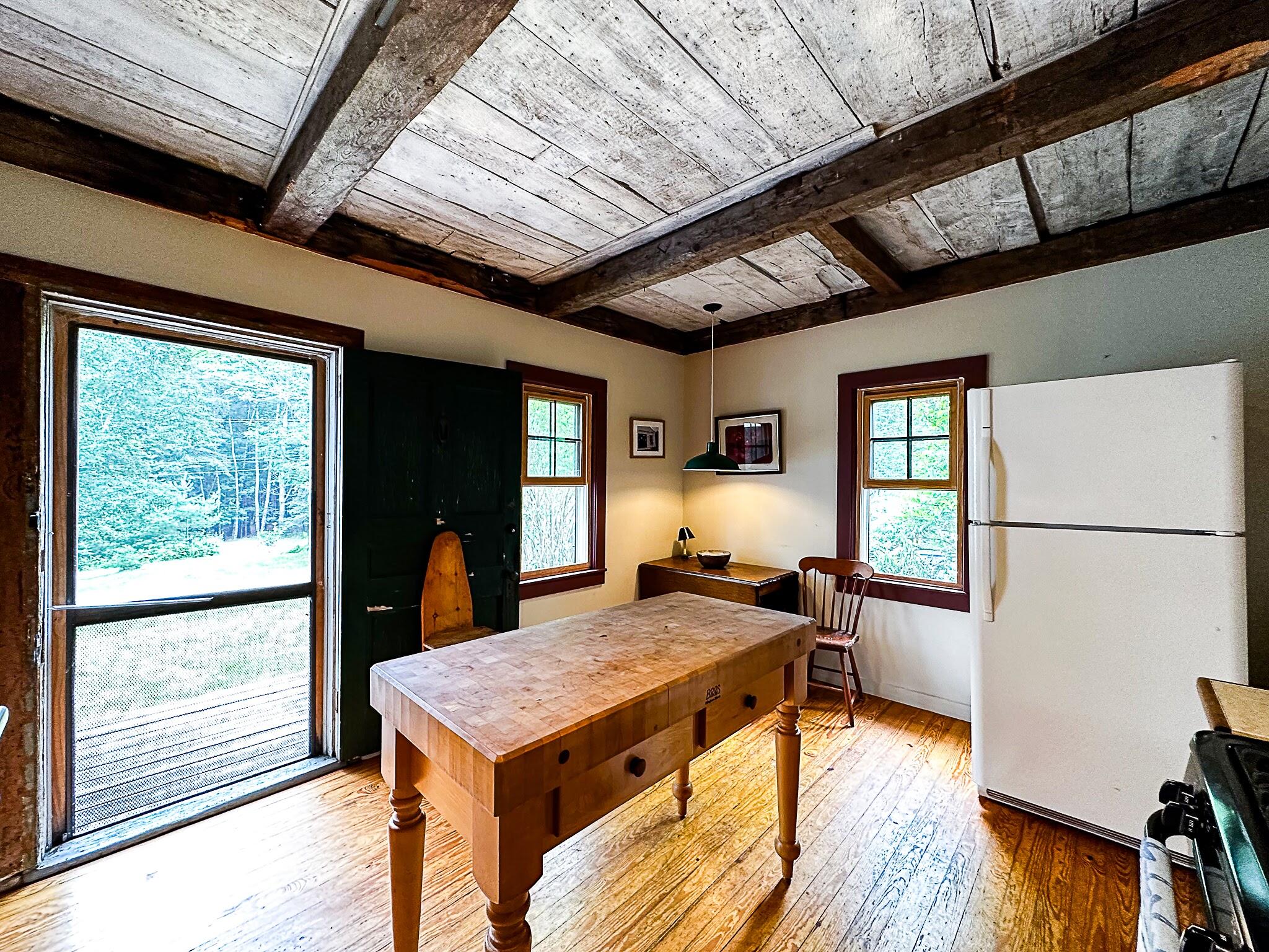 1319 Newbury Neck Road Surry, ME 04684 - Photo 9 of 68 Corner breakfast nook in kitchen.