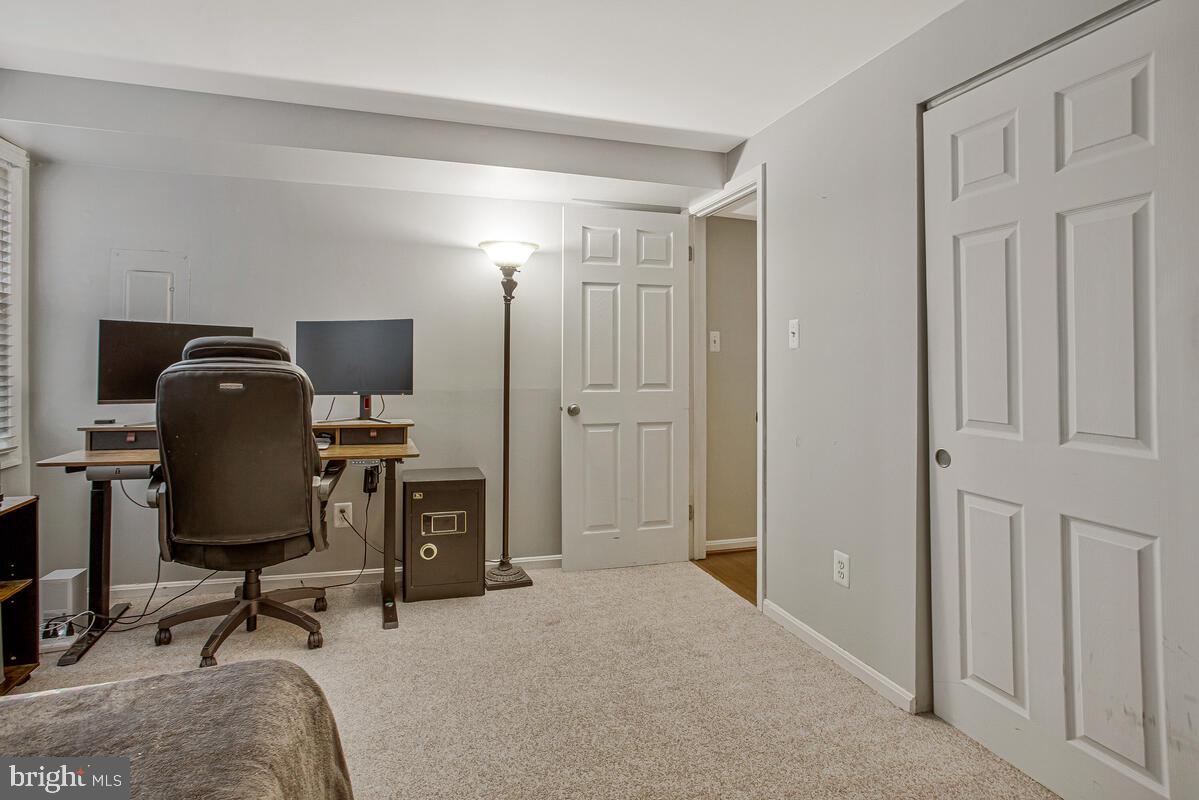 1438 Orleans Court Crofton, MD 21114 - Photo 15 of 26 a view of a workspace with furniture and a workspace