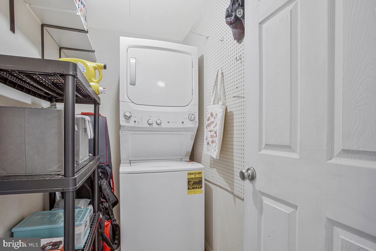 1438 Orleans Court Crofton, MD 21114 - Photo 20 of 26 a utility room with dryer and washer