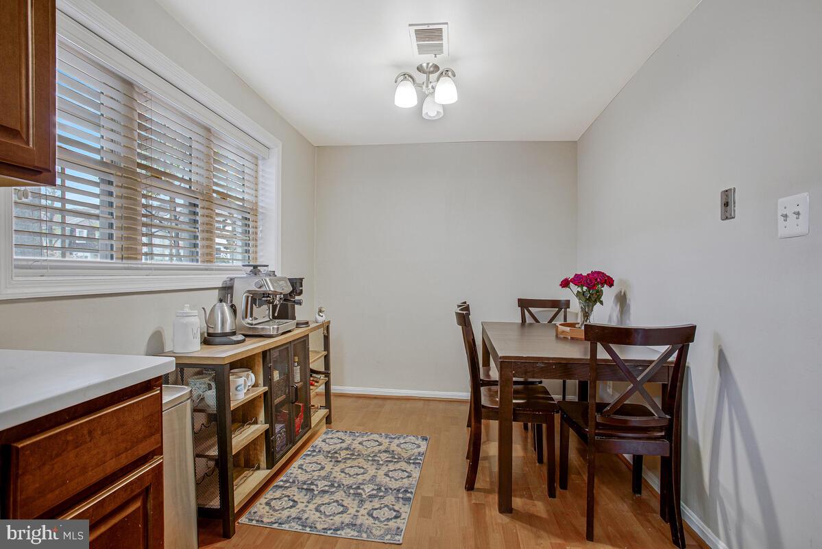1438 Orleans Court Crofton, MD 21114 - Photo 21 of 26 a view of a dining room with furniture and window
