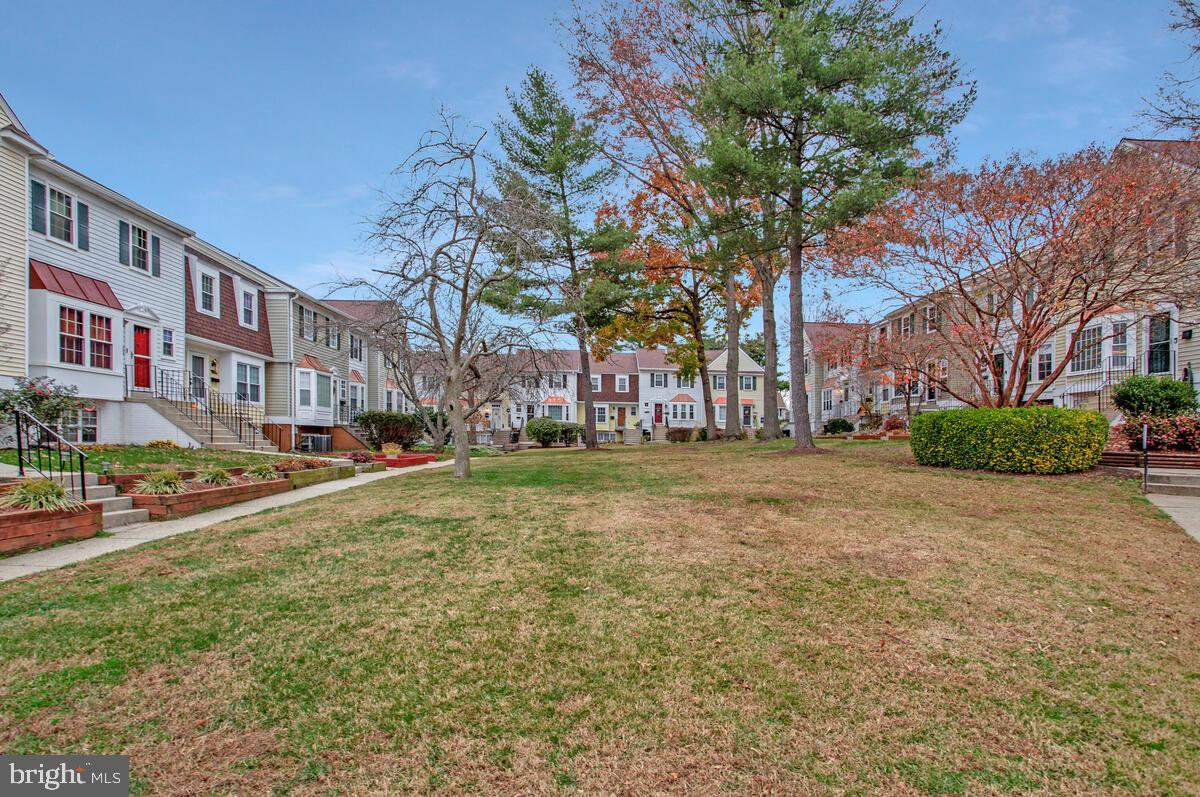 1438 Orleans Court Crofton, MD 21114 - Photo 24 of 26 a city view with tall buildings and a yard