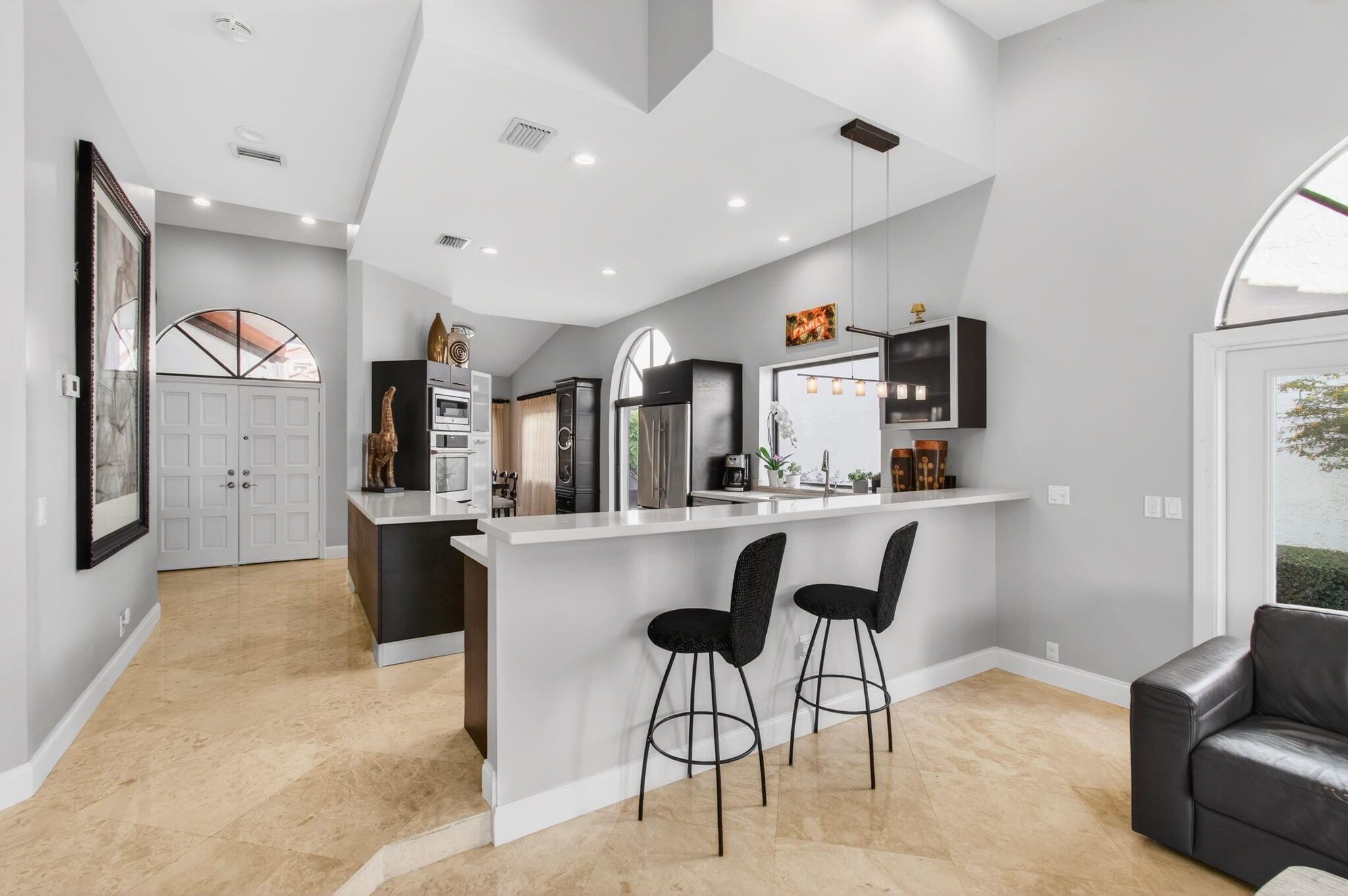 23145 Via Stel Boca Raton, FL 33433 - Photo 14 of 72 a view of kitchen with dining area