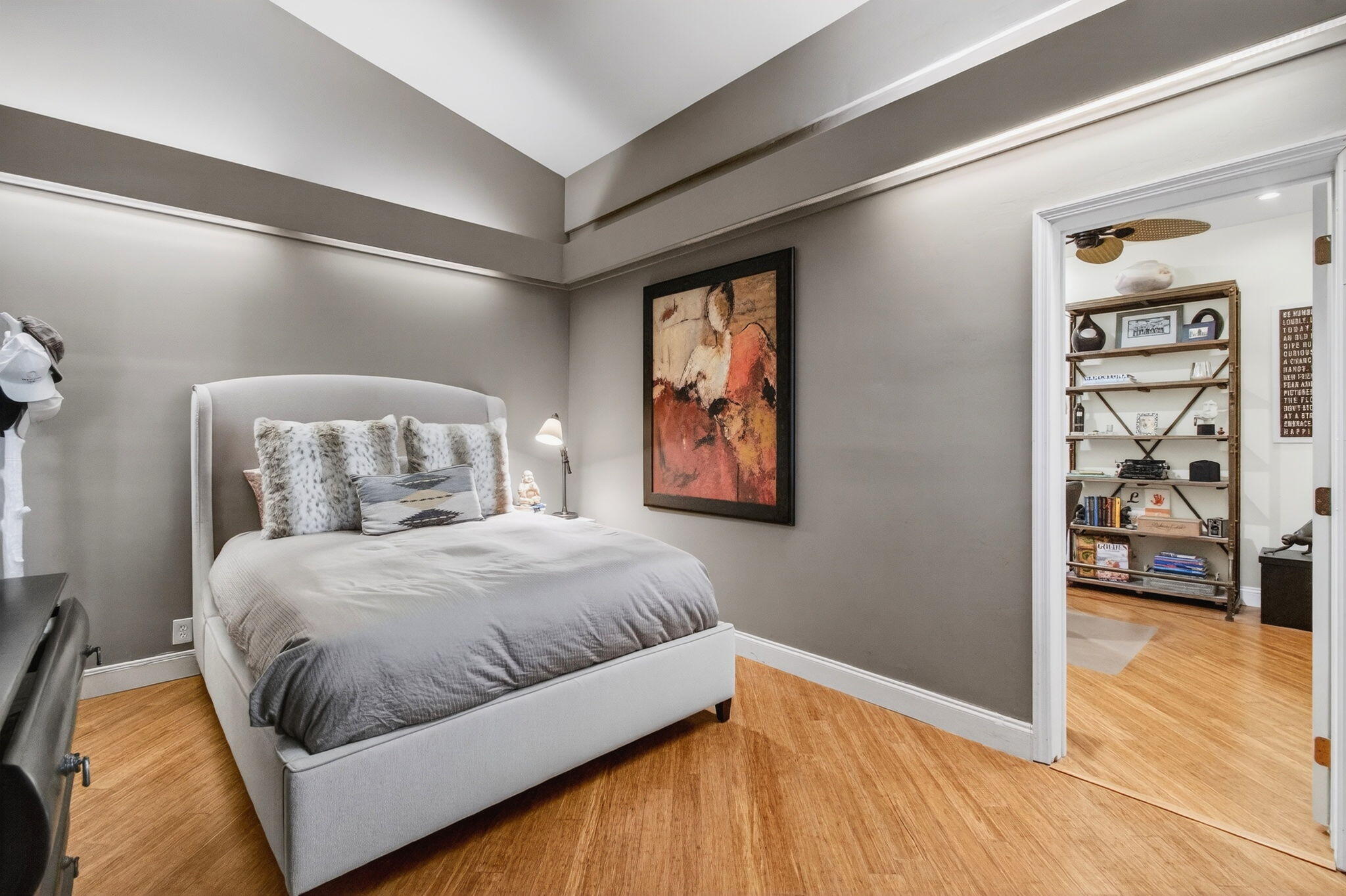 23145 Via Stel Boca Raton, FL 33433 - Photo 30 of 72 a bedroom with a bed and painting on the wall