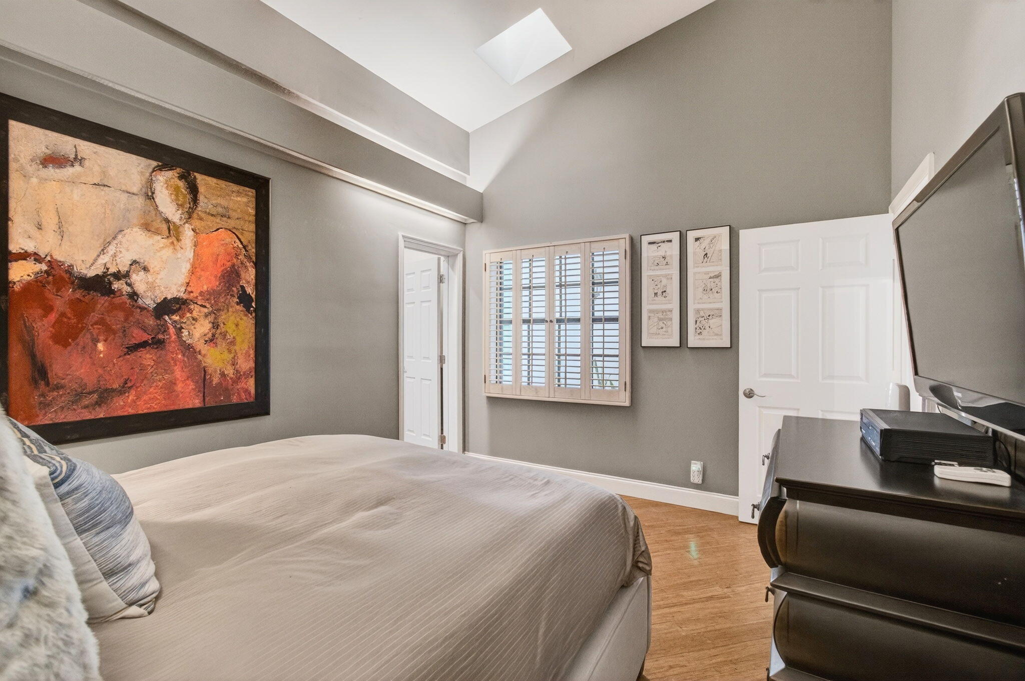 23145 Via Stel Boca Raton, FL 33433 - Photo 32 of 72 a bedroom with a bed and wooden floor