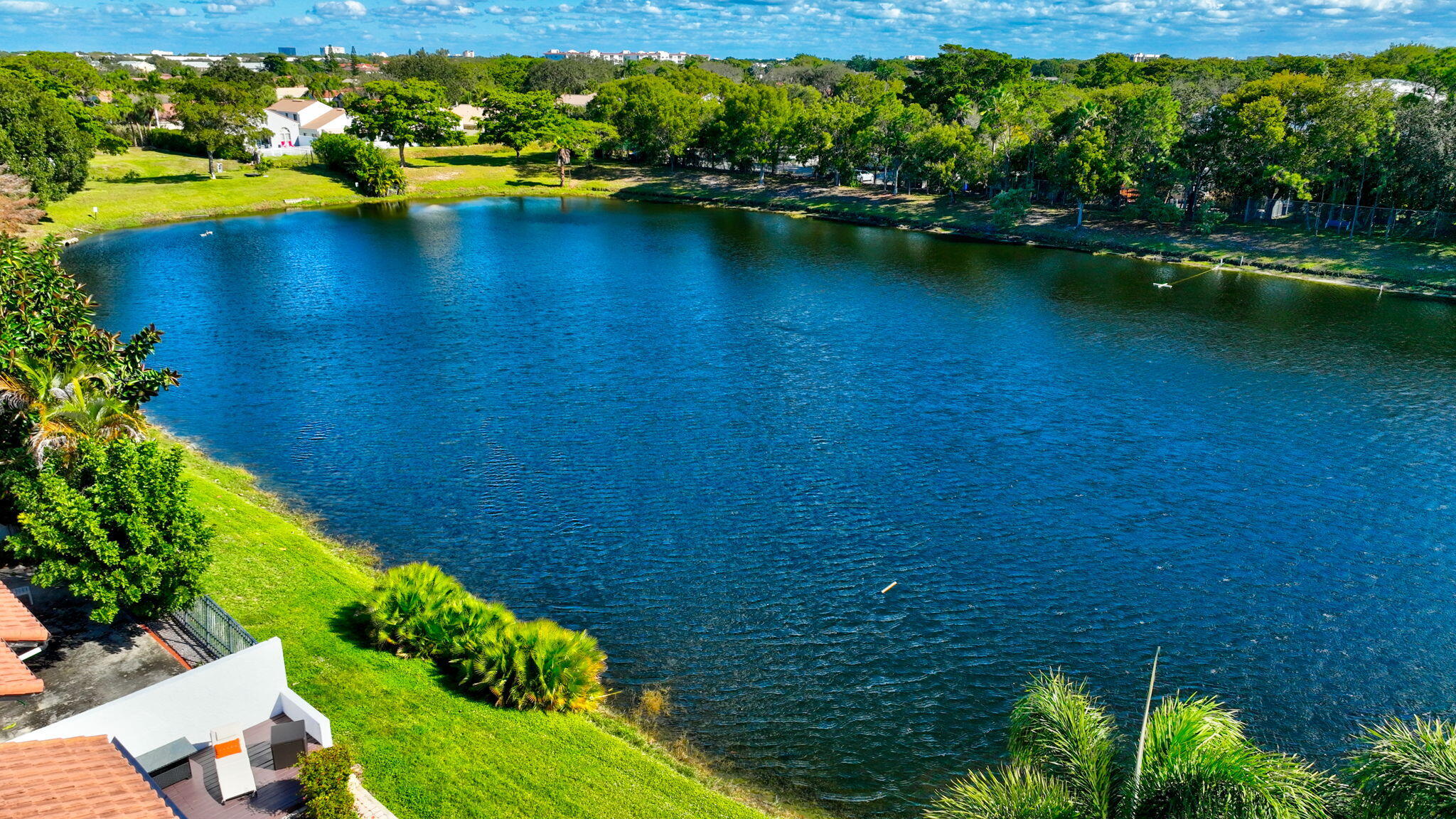23145 Via Stel Boca Raton, FL 33433 - Photo 51 of 72 an aerial view of a houses with a yard