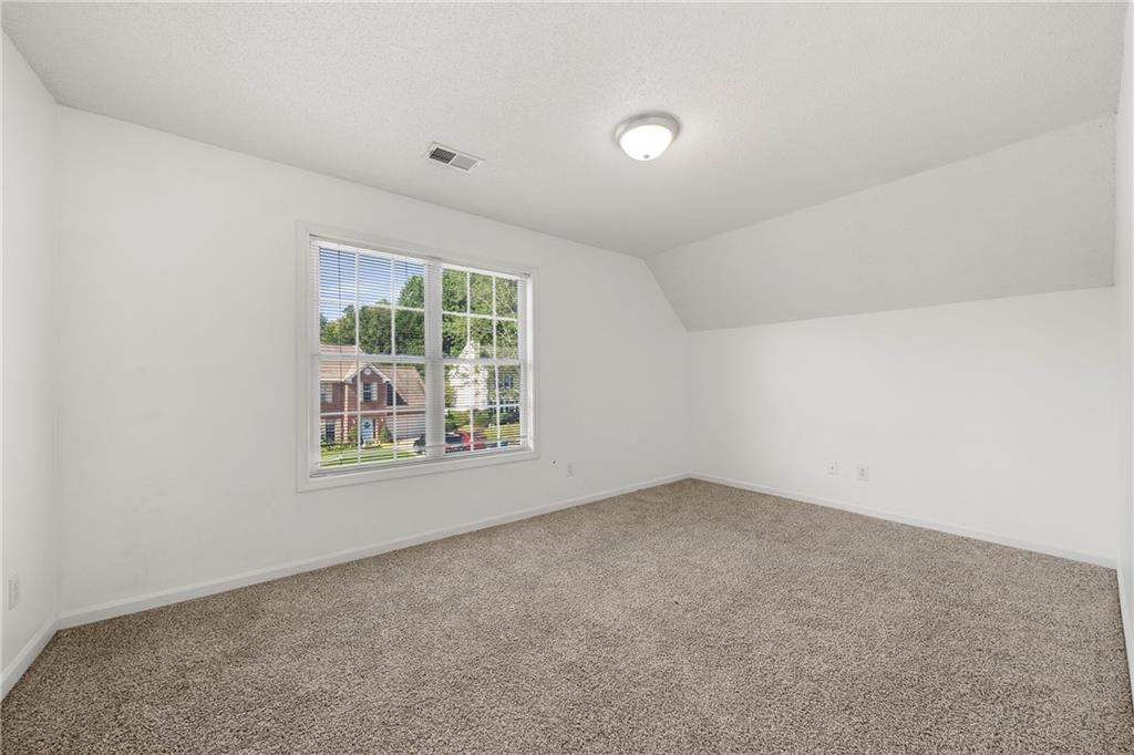 4317 Chesapeake Trace Acworth, GA 30101 - Photo 17 of 22 an empty room with a window