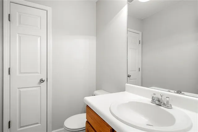 a bathroom with a sink and a toilet