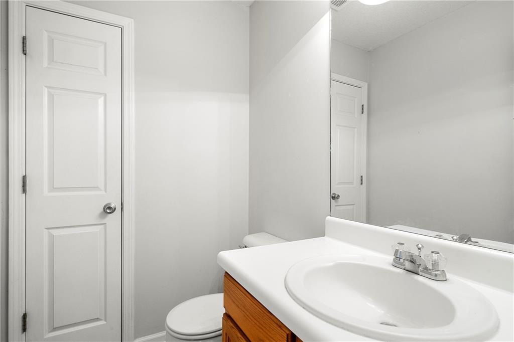 4317 Chesapeake Trace Acworth, GA 30101 - Photo 10 of 22 a bathroom with a sink and a toilet
