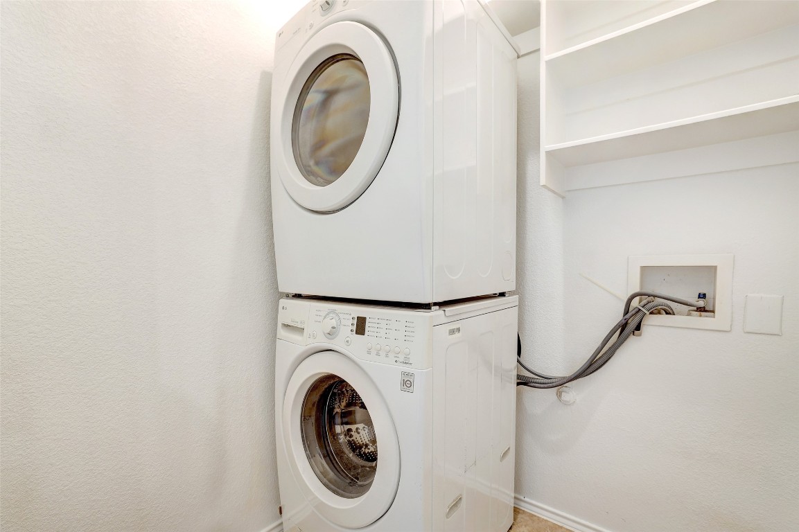 1517 Rainbow Parke Drive Round Rock, TX 78665 - Photo 34 of 38 a utility room with dryer and washer