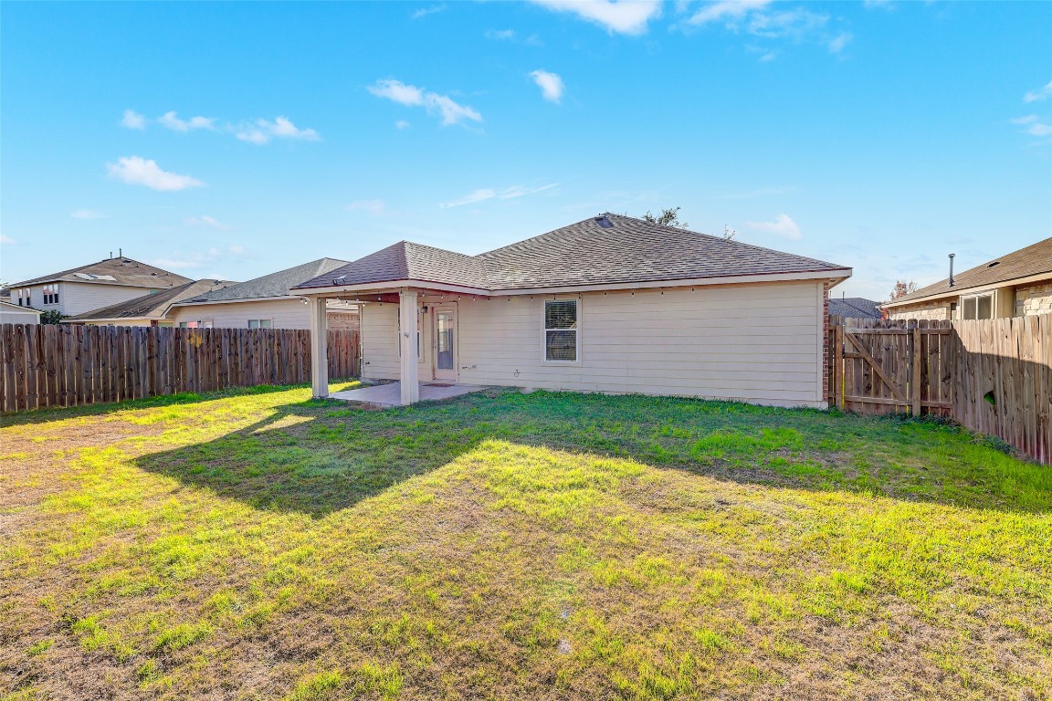 1517 Rainbow Parke Drive Round Rock, TX 78665 - Photo 35 of 38 a view of a house with a backyard