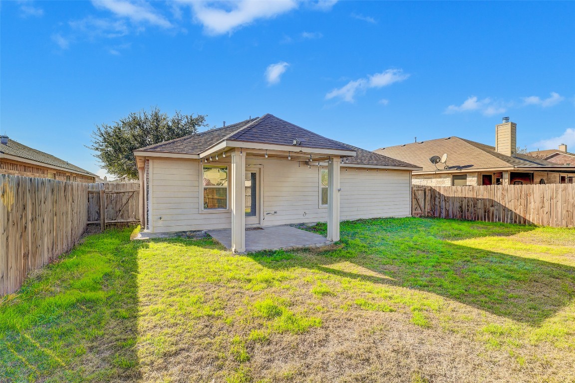 1517 Rainbow Parke Drive Round Rock, TX 78665 - Photo 37 of 38 a view of a house with a yard and sitting area