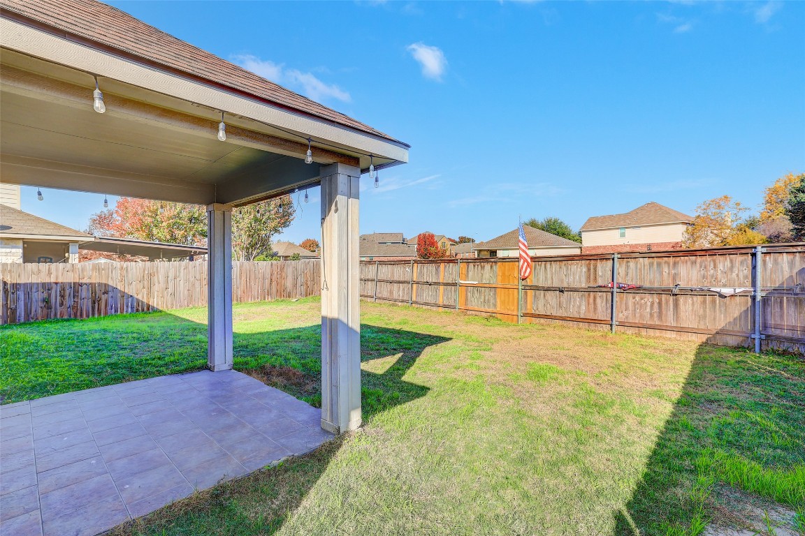 1517 Rainbow Parke Drive Round Rock, TX 78665 - Photo 38 of 38 a view of an house with backyard and porch