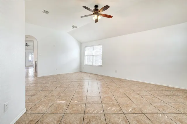 a view of an empty room and window