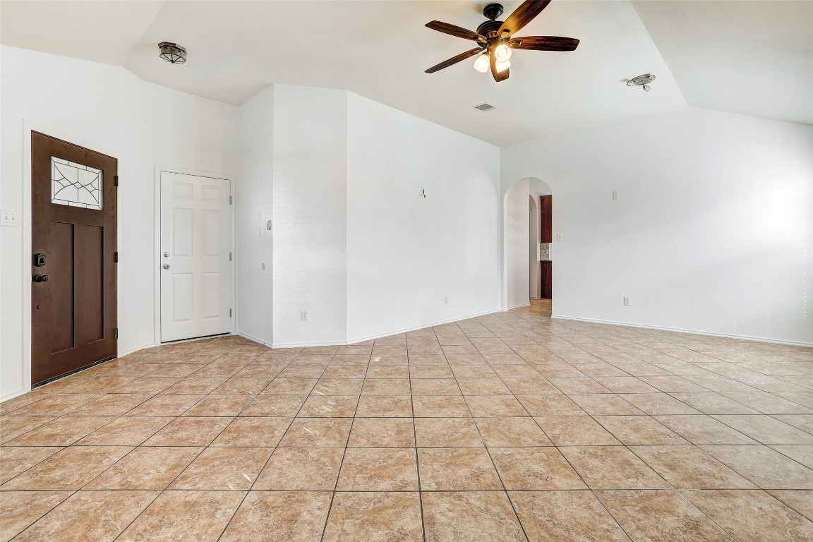 1517 Rainbow Parke Drive Round Rock, TX 78665 - Photo 7 of 38 a view of a livingroom with a ceiling fan and window