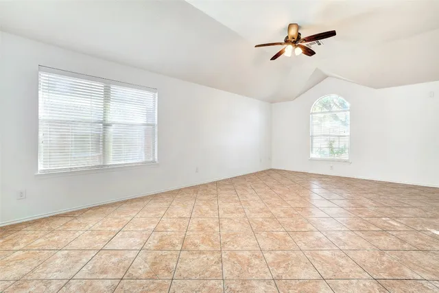 a view of an empty room and window