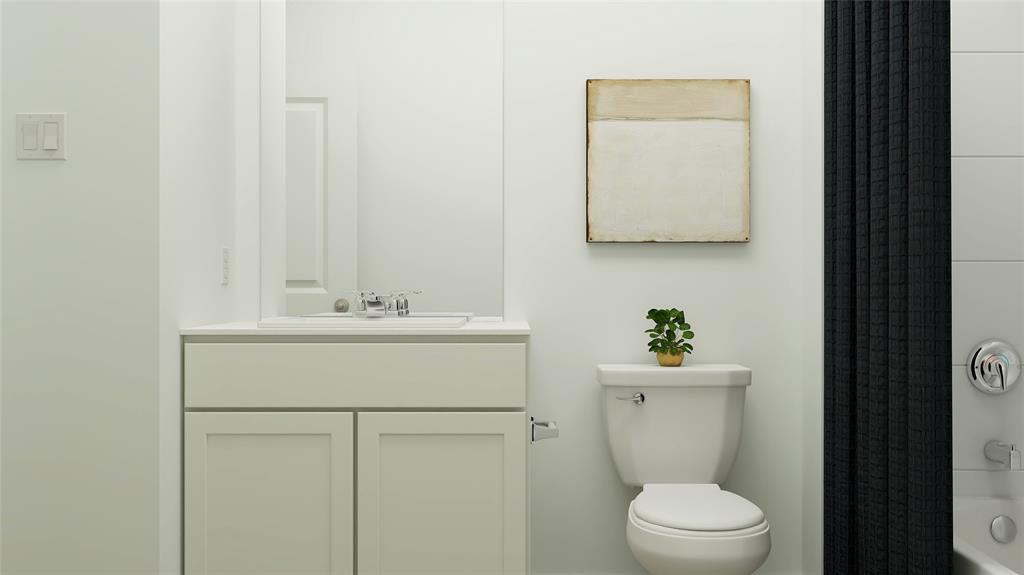 9129 Rambling Stone Way Fort Worth, TX 76179 - Photo 17 of 23 a bathroom with a sink a toilet and mirror