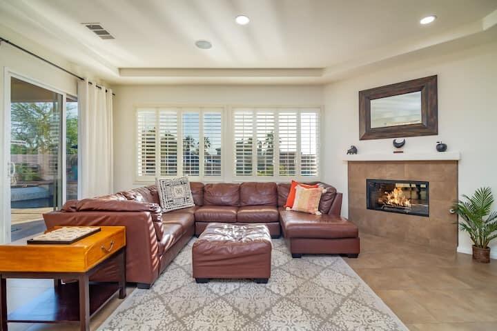 43875 Spiaggia Place Indio, CA 92203 - Photo 19 of 52 a living room with furniture and a fireplace