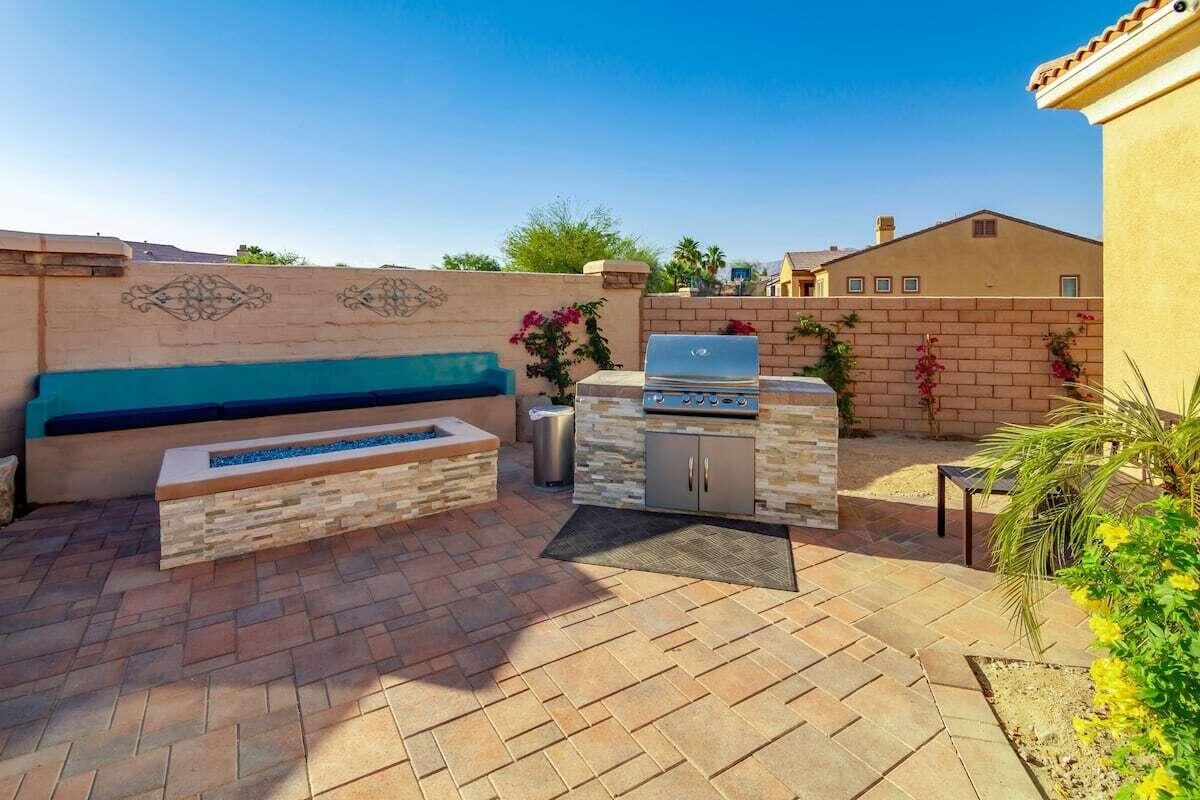 43875 Spiaggia Place Indio, CA 92203 - Photo 4 of 52 a terrace view with two chairs and a table