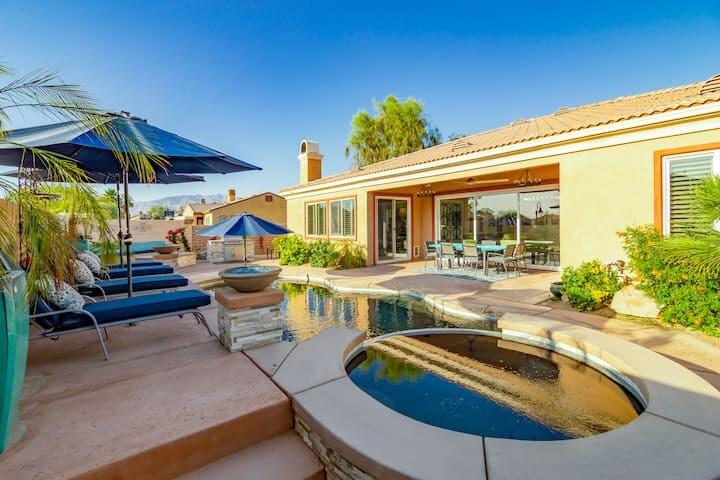 43875 Spiaggia Place Indio, CA 92203 - Photo 8 of 52 a view of a patio with swimming pool table and chairs