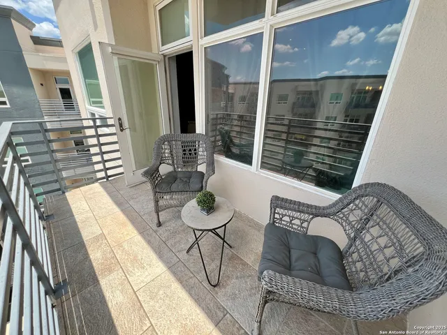 a tall building sitting on the side of a street