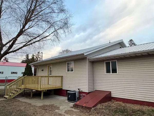 a house view with a backyard space