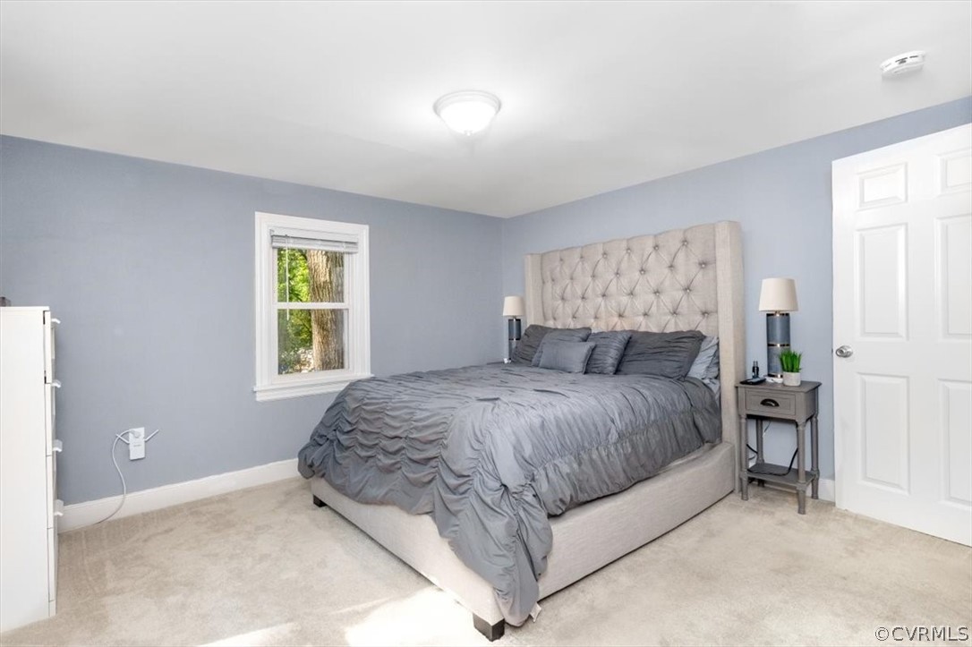 4101 Courthouse Road Chesterfield, VA 23236 - Photo 12 of 30 a spacious bedroom with a bed and a window