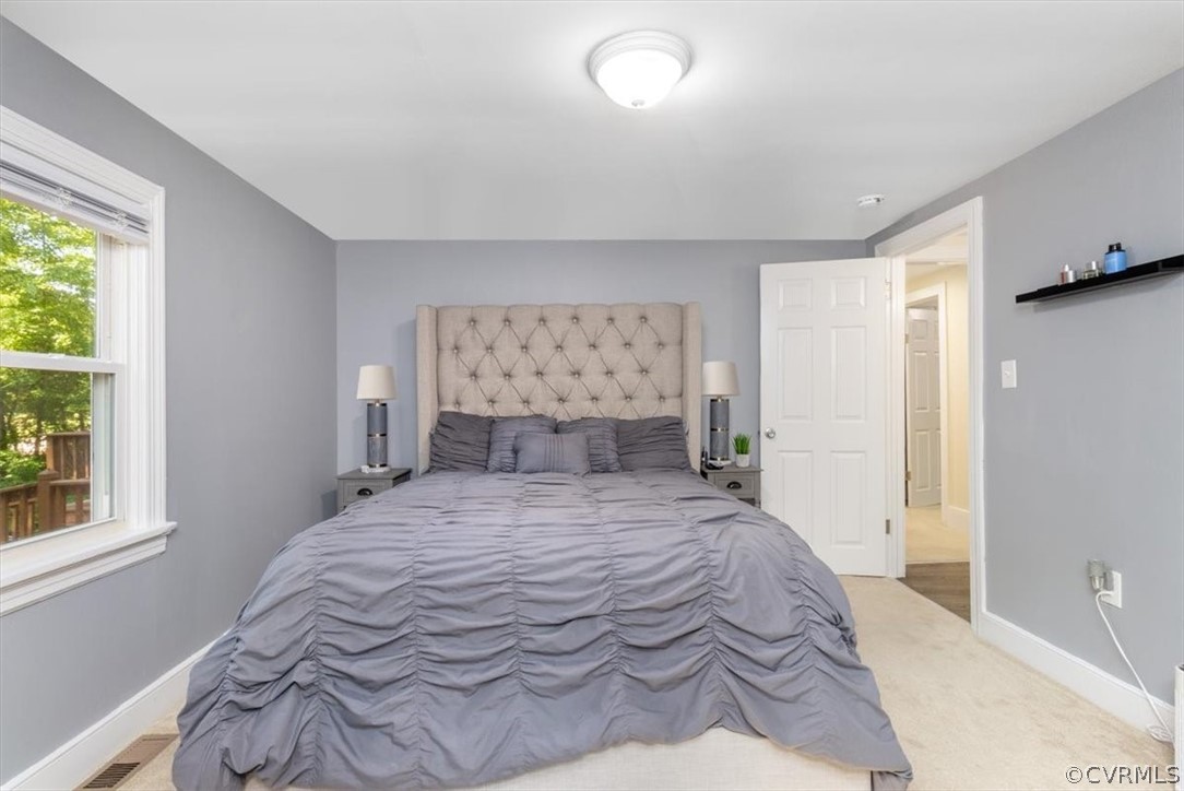 4101 Courthouse Road Chesterfield, VA 23236 - Photo 13 of 30 a bedroom with a large bed and a window