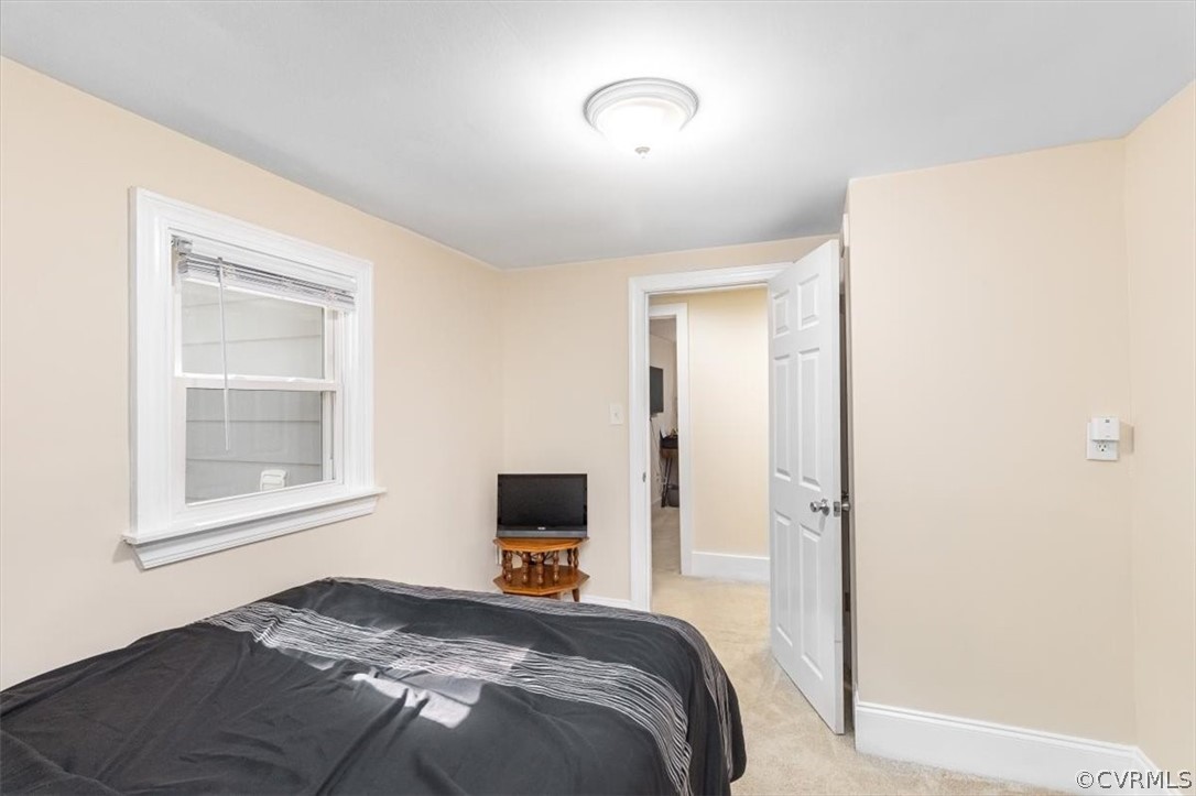 4101 Courthouse Road Chesterfield, VA 23236 - Photo 18 of 30 a bedroom with a bed and a tv