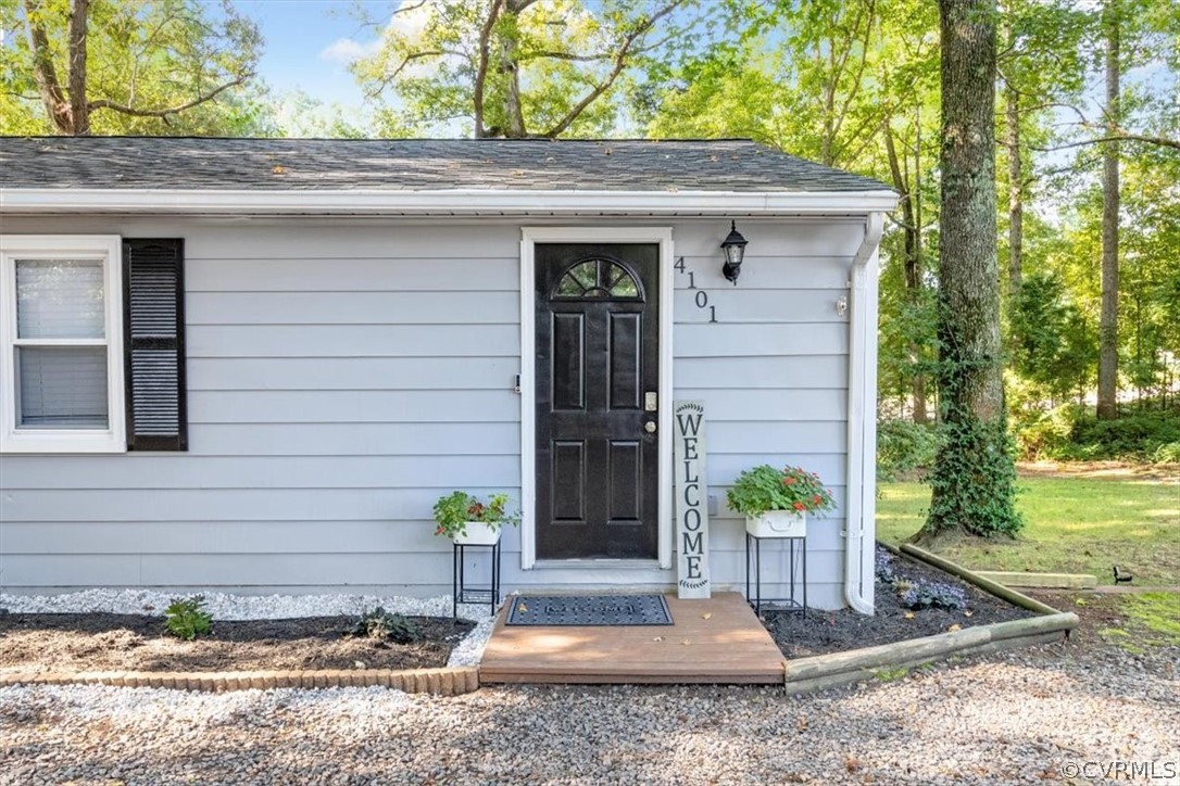 4101 Courthouse Road Chesterfield, VA 23236 - Photo 2 of 30 a front view of a house with garden