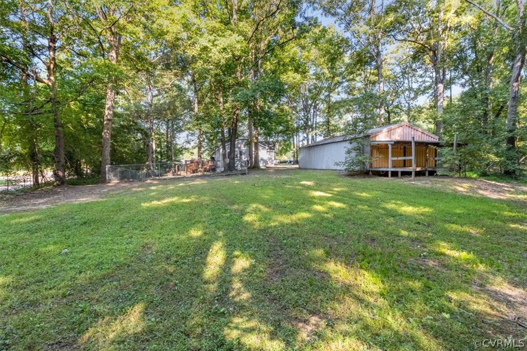 4101 Courthouse Road Chesterfield, VA 23236 - Photo 28 of 30 a front view of a house with a yard and trees