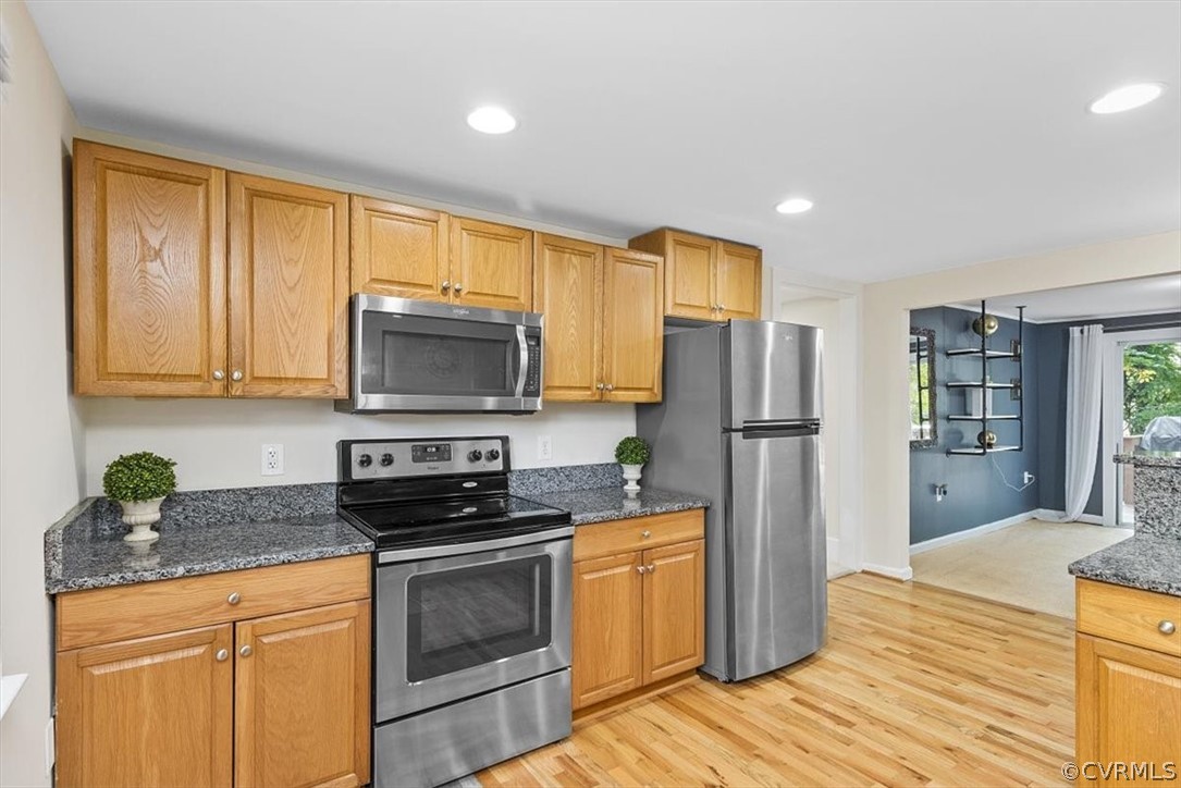 4101 Courthouse Road Chesterfield, VA 23236 - Photo 6 of 30 a kitchen with stainless steel appliances granite countertop a stove a sink and a refrigerator