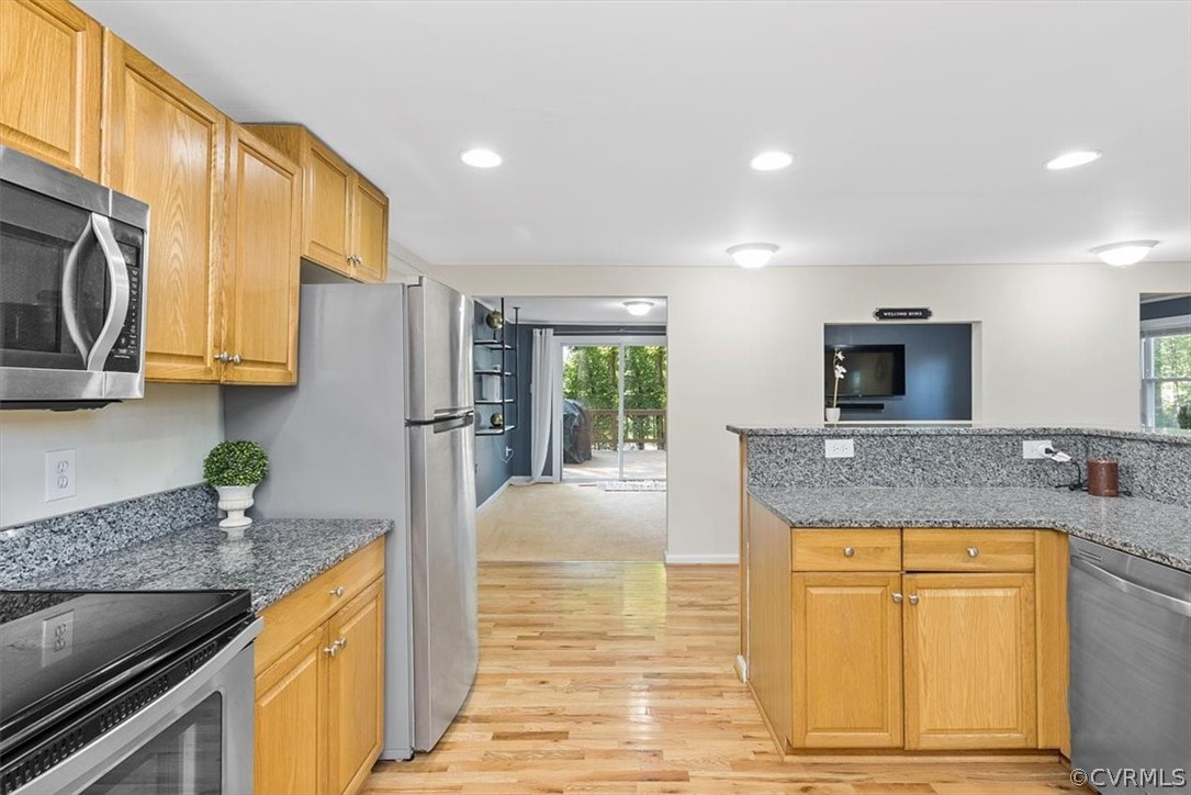 4101 Courthouse Road Chesterfield, VA 23236 - Photo 7 of 30 a kitchen with stainless steel appliances granite countertop a sink and a stove