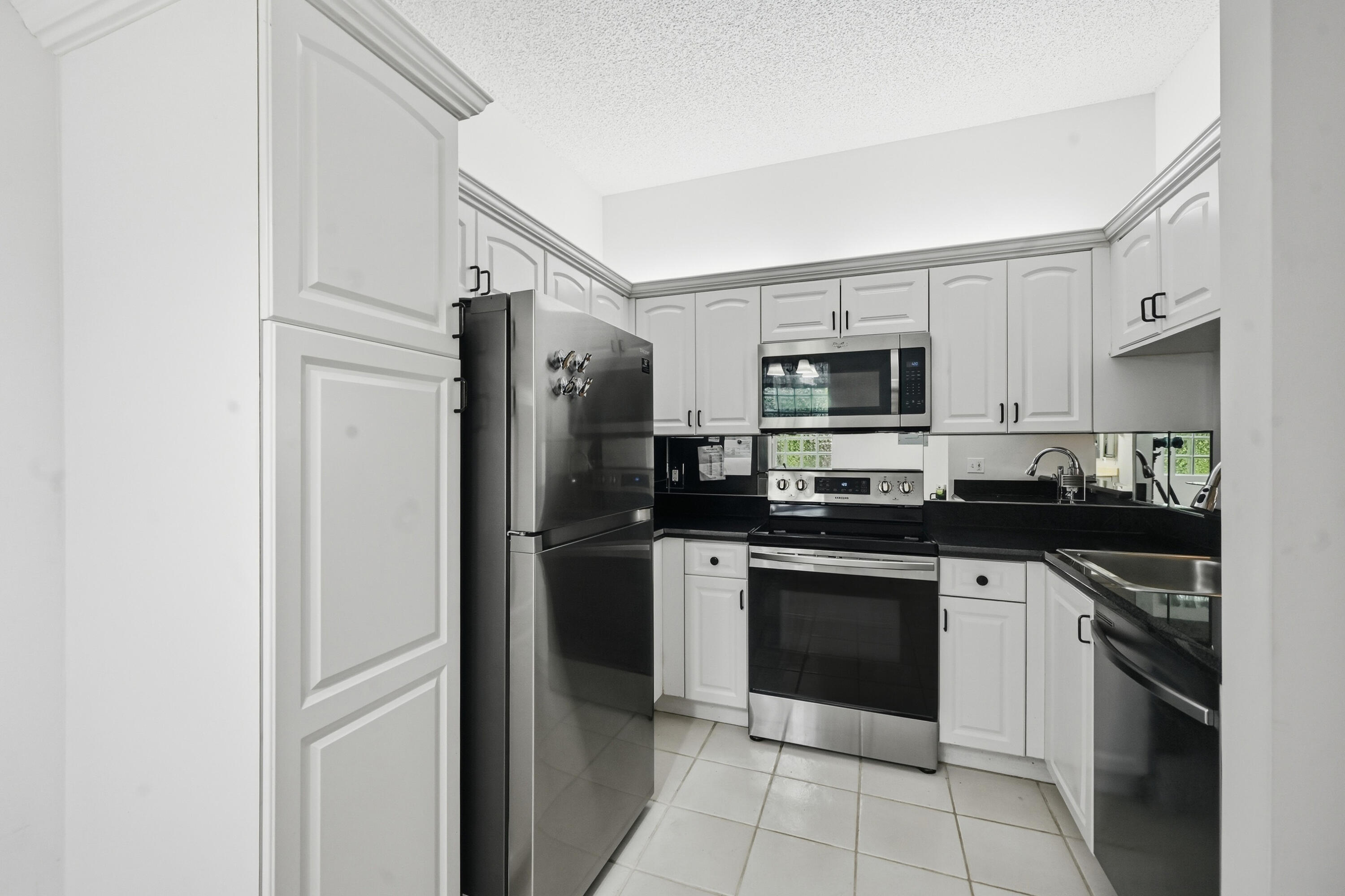 5395 Firenze Drive, Unit K Boynton Beach, FL 33437 - Photo 2 of 53 08_ra1_1015