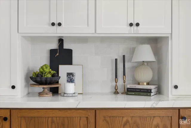 a bathroom with a sink and a window