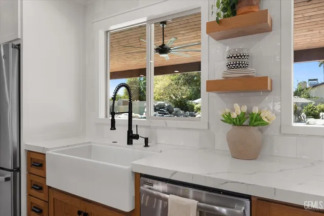 a bedroom with a bed and a dresser in it