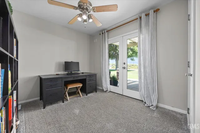 a view of a park with swings and slides