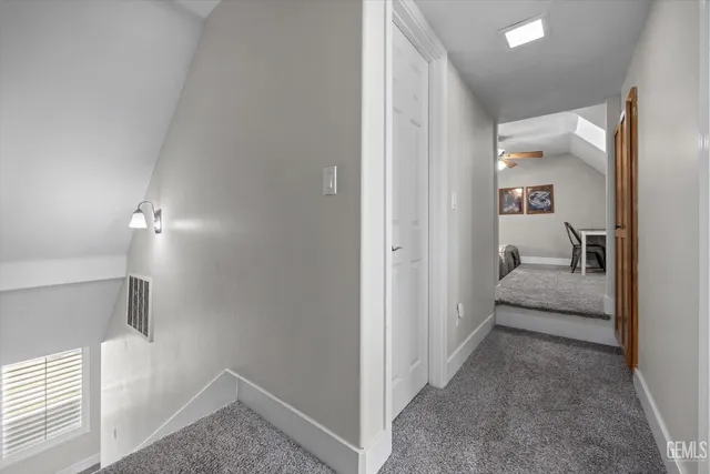 a view of a swimming pool with a yard