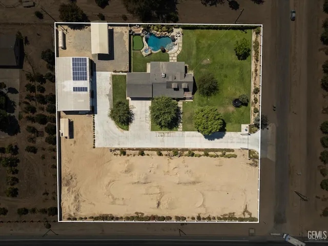 a view of a lake with a yard