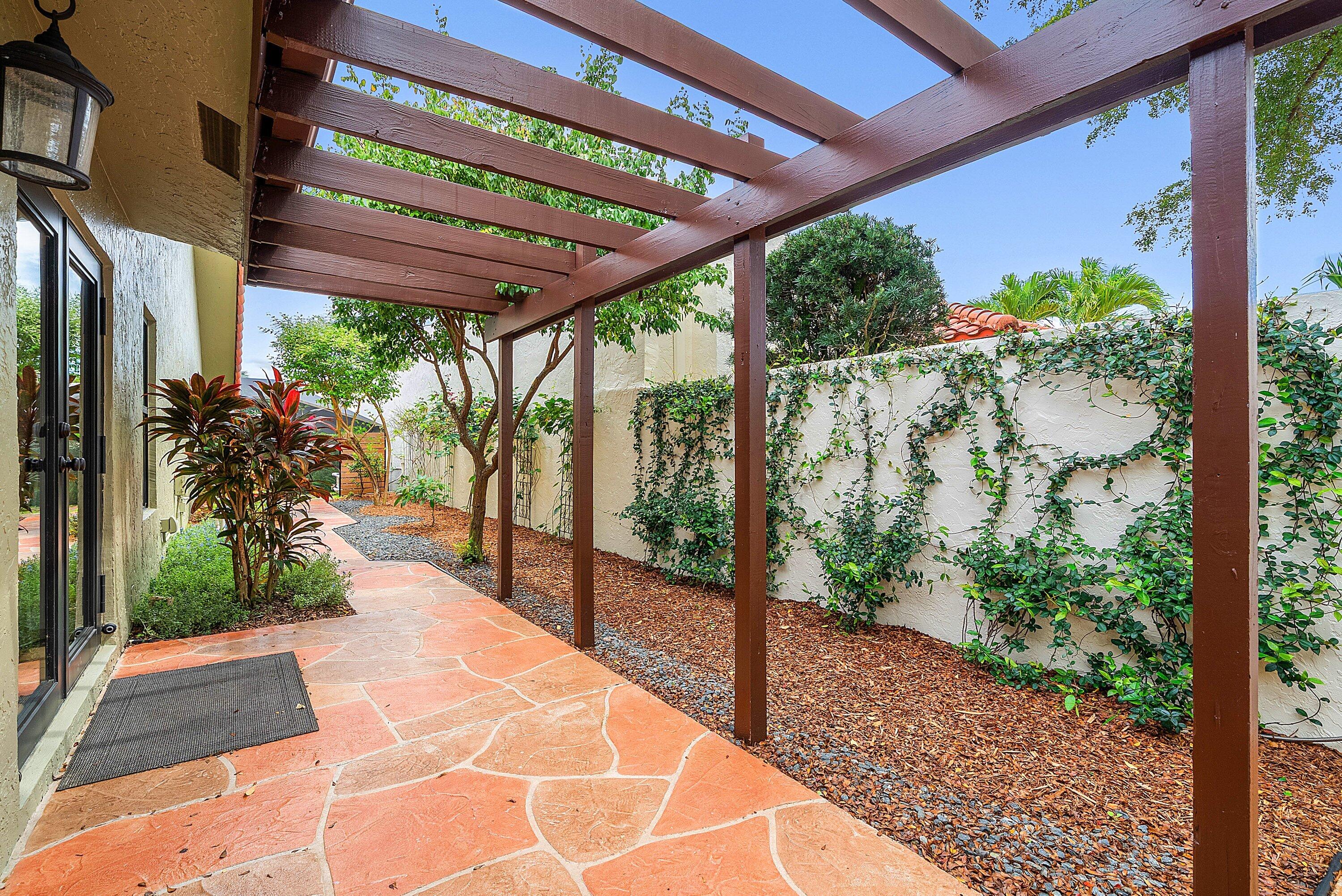 21330 Placida Terrace Boca Raton, FL 33433 - Photo 35 of 41 Pergola walk way