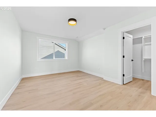 a bathroom with a toilet a sink and shower